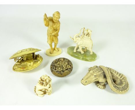 Decorative Anabori-Netsuke, Bone elephant on onyx base, crocodile, shell sculpture, Dog of Fo carving and one other sculpture