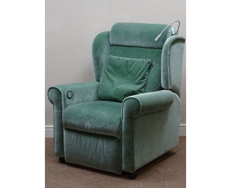 'The Recliner Factory' electric riser reclining armchair upholstered in green dralon, with reading lamp and heated seat cushi