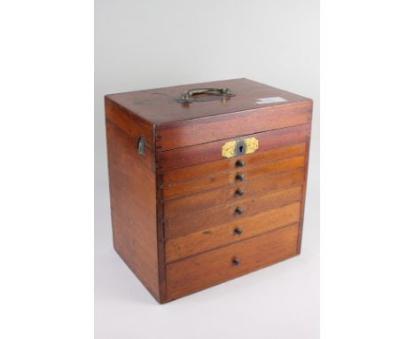 An early 20th century mahogany dentist's toolbox containing various tools, with name plaque R L Kenyon