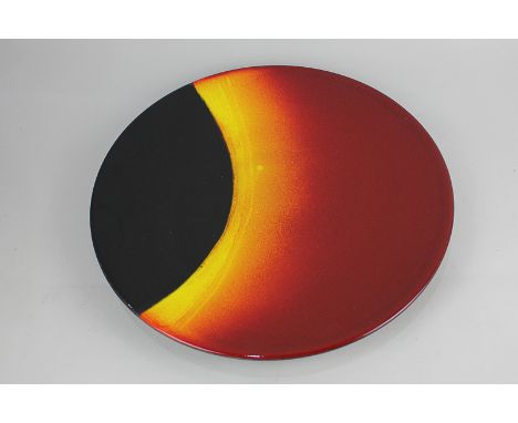 A Poole Pottery Eclipse charger by Alan Clarke, limited edition 844/1999, with certificate, 34.5cm diameter