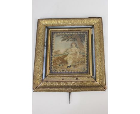 A Victorian beaded needlework panel depicting a seated girl, in gilt frame with parts of broken table top stand (a/f), 13cm b