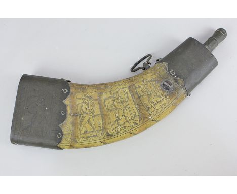 A carved and metal mounted powder flask, possibly 17th century, of flattened horn shaped form, decorated with warriors amongs