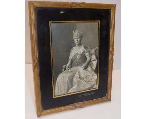 Queen Mary of Teck (wife of George V) a black and white photographic portrait study of the Queen seated in robes and crown si