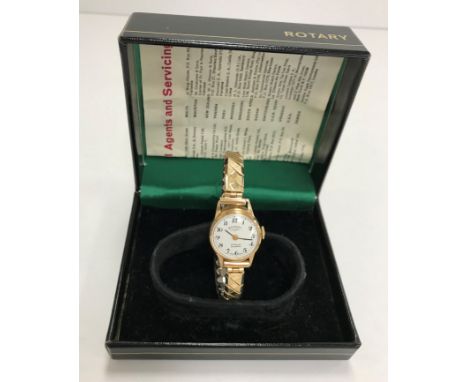 A 9 ct gold Case Rotary wristwatch on expanding bracelet, the white enamel dial set with Arabic numerals, inscribed "Rotary 1