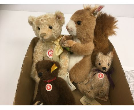 A collection of Steiff bears comprising Classic mohair blonde Bigfoot bear No.'d 2922, a Classic alpaca brown bear No.'d 2769