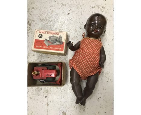 An early 20th Century Armand Marseille black bisque headed doll, stamped verso "AM Germany 520/2¼K" to back, together with a 