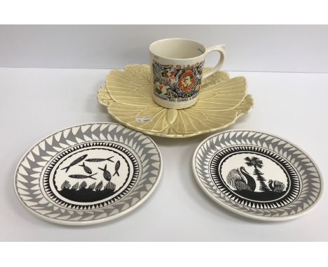 Two Royal Worcester Crown Ware saucers,  monochrome decorated by Scottie Wilson one with fish and seaweed 16.7 cm diameter, t