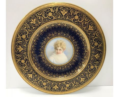 A Vienna cabinet plate, the centre panel decorated with "Allegorie nach Tiziano", inscribed "Wahliss Wien", bearing blue unde