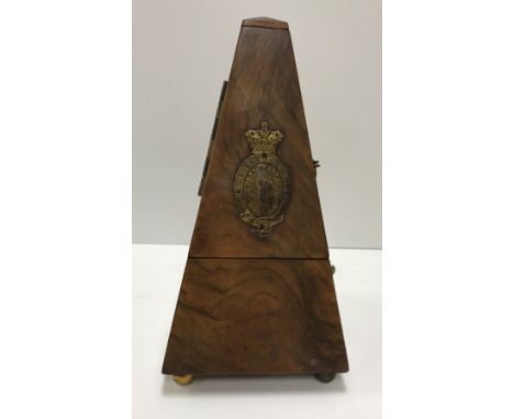 A Victorian Maelzel walnut cased metronome, the interior with measure stamped "Chappell &amp; Co. London", 24 cm high
