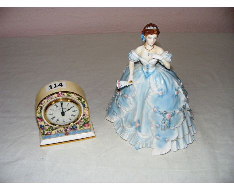 A Royal Worcester porcelain figurine 'The First Quadrille' and a Wedgwood 'Sarah' clock, the clock measuring 12cm tall and th