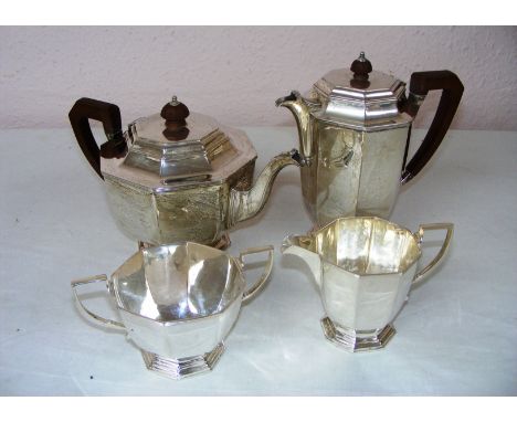 A sterling silver four piece tea service by Mappin & Webb hallmarked for Sheffield 1960, the coffee pot is 16cm as a size gui