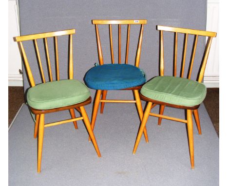 Three Ercol chairs, each measuring 31" as a size guide.