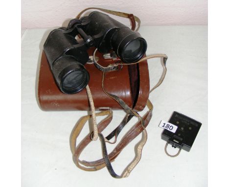 A pair of Carl Zeiss Jena binoculars in case and a World War II marching compass. 