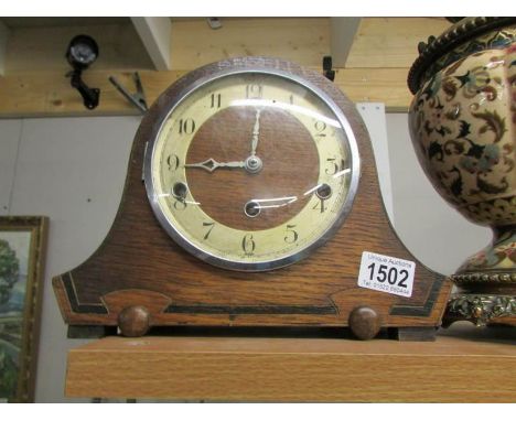 A Westminster chime mantel clock.