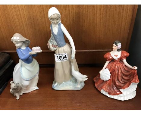 Two NAO figurines including girl with dog and lady with geese and another lady figurine