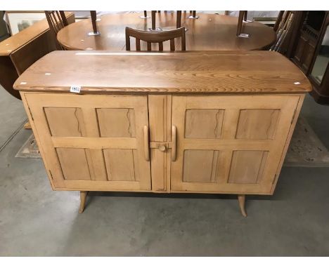 An  Ercol light sideboard.