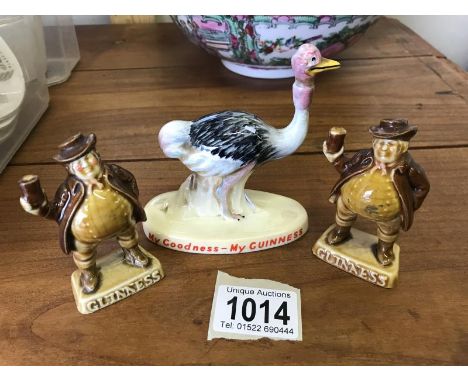 A Carltonware Guinness advertising ostritch and a pair of Guinness figures