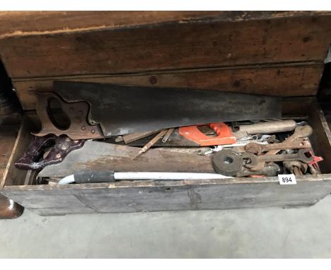 An early 20th Century wooden tool box with a large quantity of tools