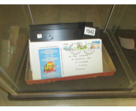 A quantity of first day covers.