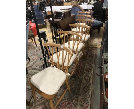A set of 6 Ercol Windsor latticed dining chairs.
