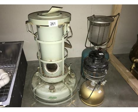 An oil lamp, oil heater &amp; a gas lamp