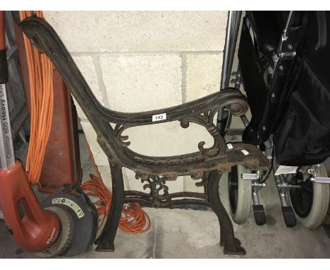 A pair of cast iron bench ends