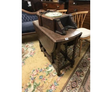 An old oak gate leg table.