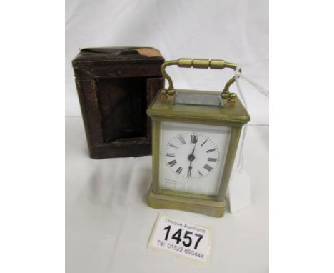 A small brass carriage clock in original case (case a/f).