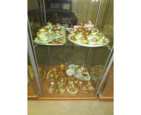 A collection of assorted miniature tea sets with floral patterns including Lime House Studio, Union K, Sanderson Bentley etc.