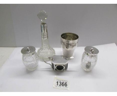 4 silver and glass items - Pair of condiment pots (Mark Wills, Sheffiled 1907) with whtie metal spoon, a dressing table bottl