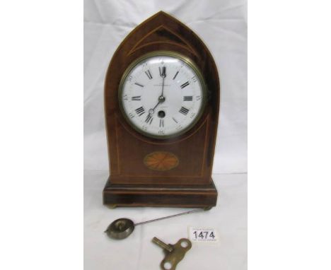 A Mappin and Webb inlaid mantel clock.