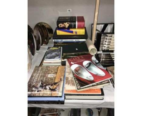 A quantity of assorted books including Lincolnshire, Nottinghamshire, art, motto racing &amp; a quantity of maps