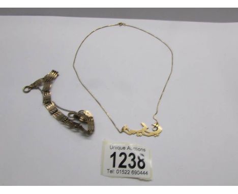 A 9ct gold hall marked gate bracelet (8g) and an Arabic pendant on 18ct gold chain marked 750 (pendant and chain approximatel