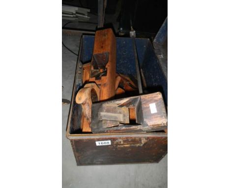 A tin box of old tools.