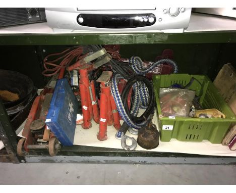 A quantity of car maintenance tools including trolley jack, tow rope etc.