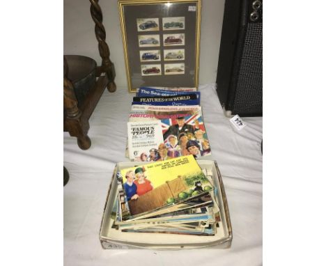 A quantity of postcards, tea cards in albums and a picture featuring vintage car tea cards