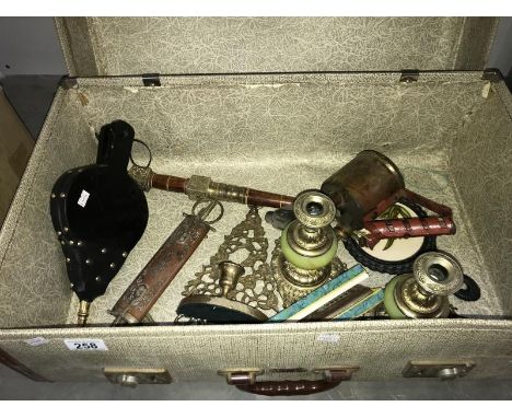 A box of miscellaneous including candlesticks, bellows &amp; boxed harmonica etc.