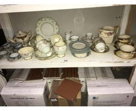A mixed lot of teacups, saucers, plates, jugs &amp; teapots