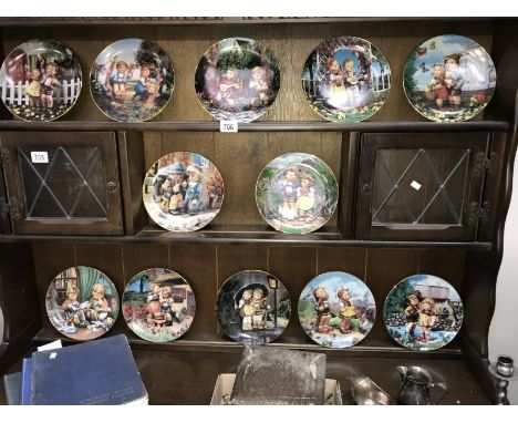 A set of 12 boxed Hummel plates