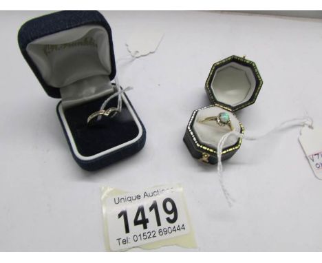 A 9ct gold ring set with opal (Birmingham 1983) and a 9ct gold ring set with diamonds (Sheffield import 375).