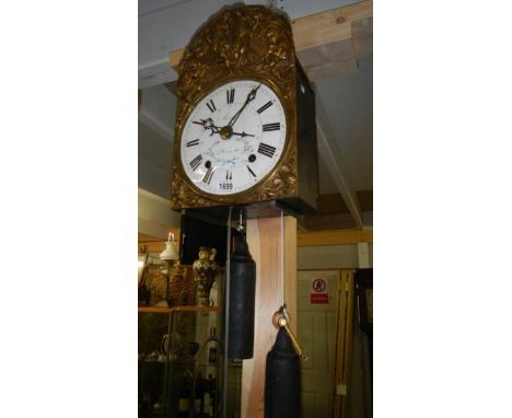 A French Meunier porcelain face clock movement with 2 weights, key and bracket for wall.