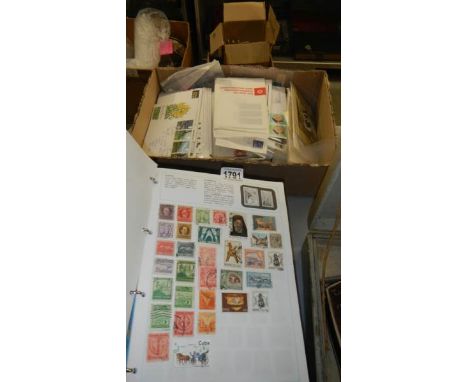 A quantity of stamp albums with stamps and a box of first day covers and other stamps.