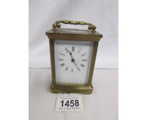 A French brass carriage clock, spring a/f.