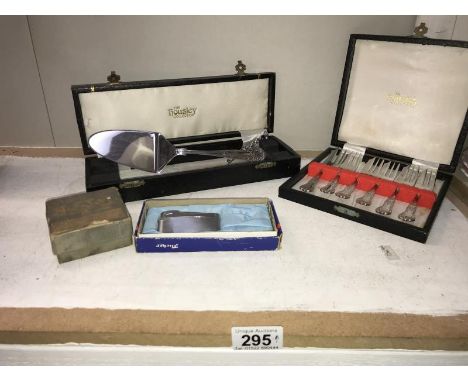 A miscellaneous selection of cutlery, a boxed flicker lighter &amp; a game of Air Sea Rescue etc.