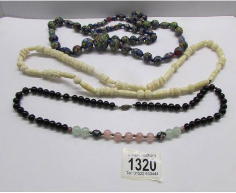 A Murano glass millifiori bead necklace, approximately 30" in length with 2 further vintage bead necklaces.