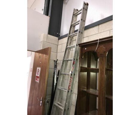 An aluminium double extending ladder
