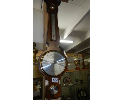 A mahogany barometer.