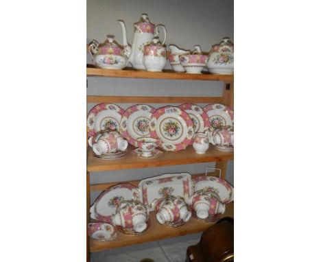 61 pieces of Royal Albert Lady Carlyle tea and coffee ware including teapot, coffee pot, milk jugs, sugar bowls, side plates,