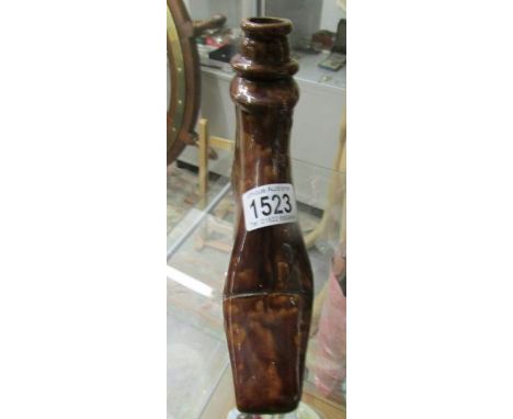 A ceramic boot decanter.