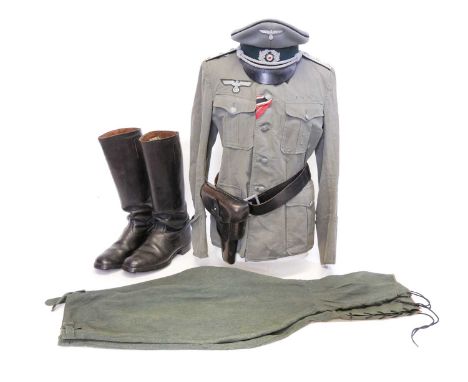 German WWII Pioneers Cap, a tunic, pair of breeches, pair of boots, P38 holster and belt German WWII Pioneers Cap, maker mark